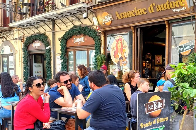 Palermo, a tour of unique monuments and colorful markets - Ancient walls, Porta Carini, and walking into Capo
