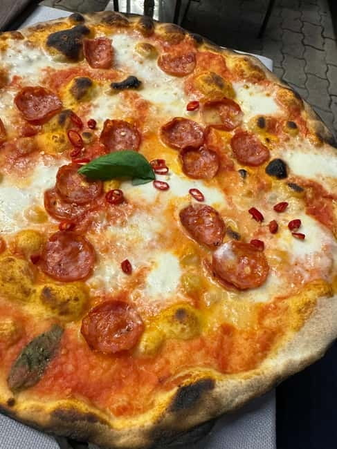 Palermo: Pizza & Tiramisu Class with Free Flowing Fine Wine - Shaping the Pizza, Adding Sauce, and Choosing Toppings