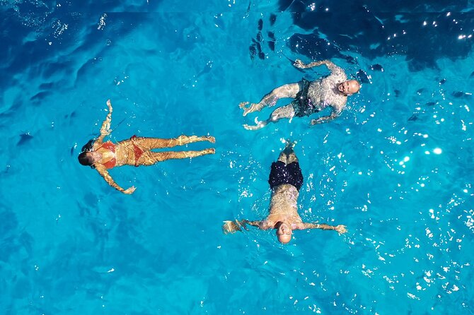Private Boat Tour to discover Favignana and Levanzo from Trapani - Stop 1, Scogliera Cala Azzurra for a quick warm-up swim