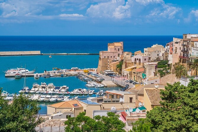 Private dinghy tour in San Vito lo Capo - Cala Rossa (and possibly Cala Bianca): the white-pebble plus red-rock vibe