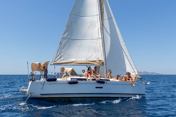 Private Sail Boat Tour to Favignana and Levanzo from Trapani - Stop 1: Cala Azzurra, the First Real Water Time