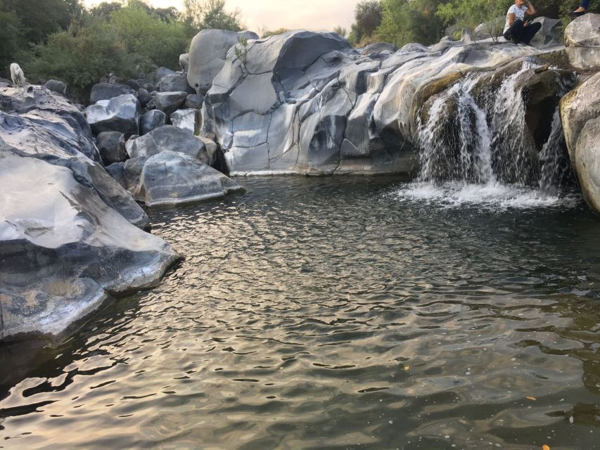 Private Tour of Alcantara Gorges. Including Food and Wine - Swimming and Sun-Bathing: Cool Water, Rocky Spots, and Timing Your Breaks