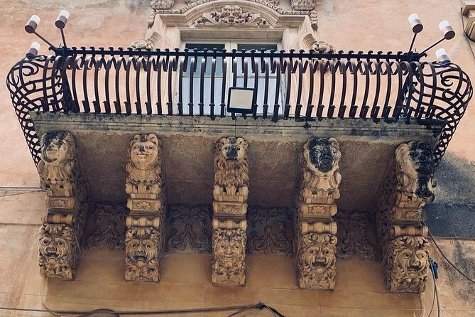 Private tour of the Baroque cities of Eastern Sicily - Modica in motion: San Giorgio, an old portal, and chocolate