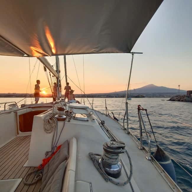 Sailboat Tour with Apertif in the islands of the cyclops - Sailing out of Catania: safety, comfort, and that on-board music