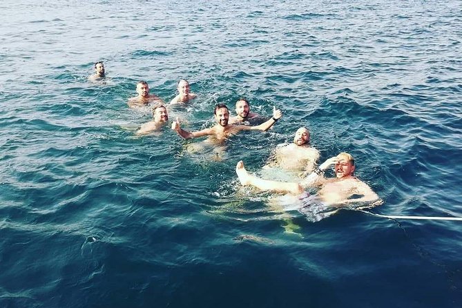 Sailing tour at sunset in catania - The second Ognina stop: lava flows, Etna in frame, and another swim chance