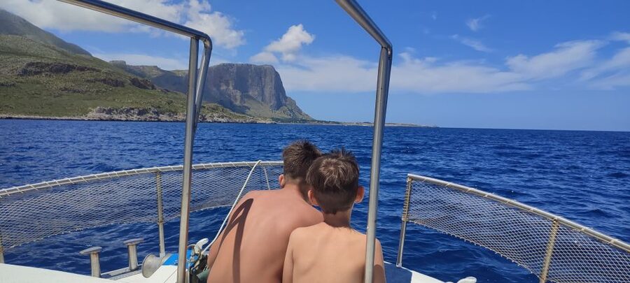 San Vito Lo Capo: Boat Trip with 3 Swimming Stops and Snacks - The first swimming stop around Cala ‘Mpiso