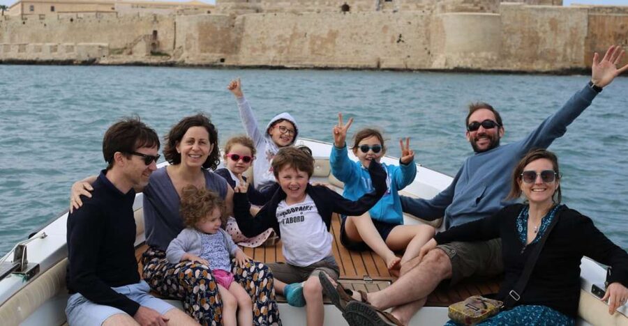 siracusa boat tour with visit to sea caves and ortigiaisland - Umbertino Bridge, Foro Italico, and the Duomo from sea level