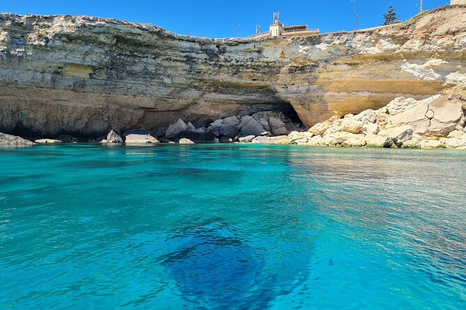 Sunset boat tour with aperitif and swimming break - Boat comfort, small group energy, and the English narration