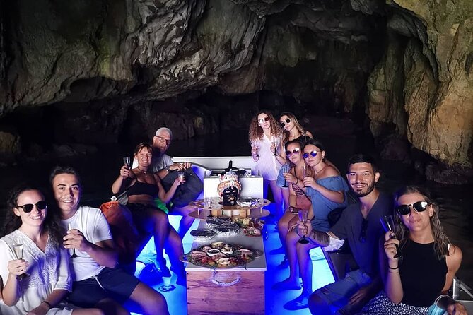 Syracuse Aperitif boat at Sunset island and sea caves - The departure run: Capuchin Cove, first cave, and a dolphin-shaped rock