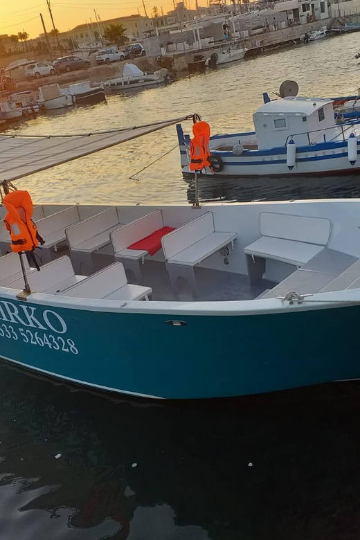 Syracuse: Boat Tour with Captain Mirko, Snorkeling & Caves - Ortigia Island, but viewed from the boat