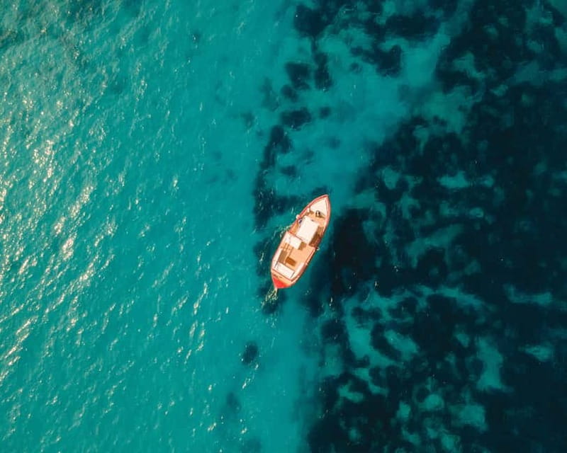 Syracuse: Boat Trip with Lunch, Wine, and Swimming Stops - Food and drinks on board: the value case for booking this instead of piecing it together