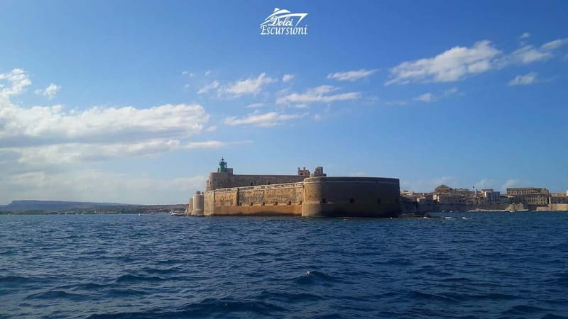 Syracuse: Boat Trip with Lunch, Wine, and Swimming Stops - How the day flows: photo stops, guided bits, and deck time