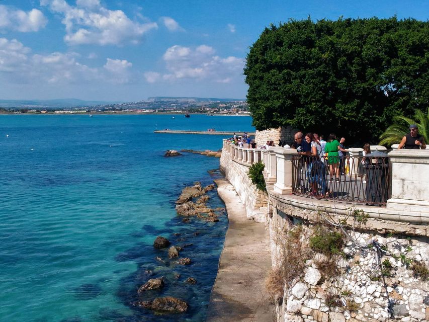 Syracuse: Ortigia Classic Walking Tour - Aretusa spring and Castello Maniace views: myth, papyrus, and the sea