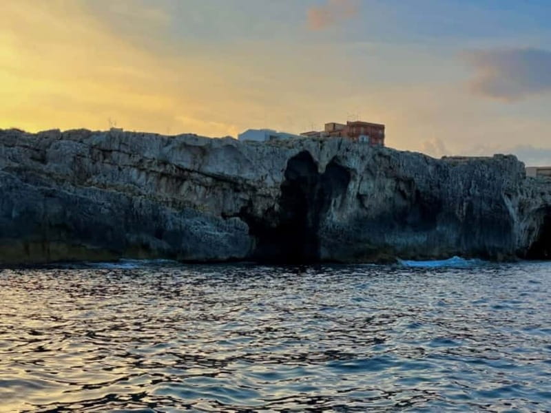 Syracuse: Ortigia Island and Sea Caves Boat Tour with Drinks - Castello Maniace and the Alfeo seafront views: monuments from a new angle