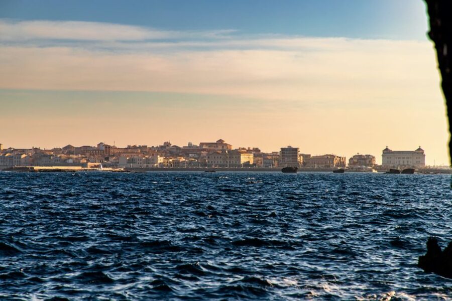 Syracuse: Ortigia Island Boat Tour with Lunch and Wine - Swim stops in clear water, with time to actually enjoy them