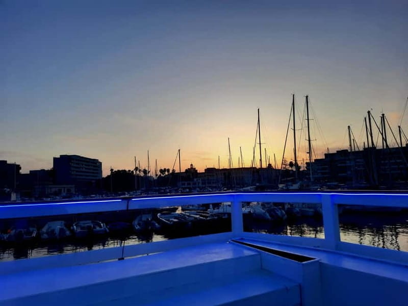 Syracuse: Sunset cruise including aperitif and swim stop - North Syracuse sea caves and animal-shaped rocks