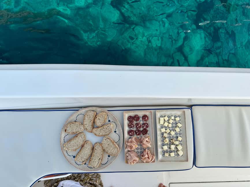 Taormina: Boat Tour with Sicilian Wine Tasting - Guide and skipper vibe: how you’ll be treated on board