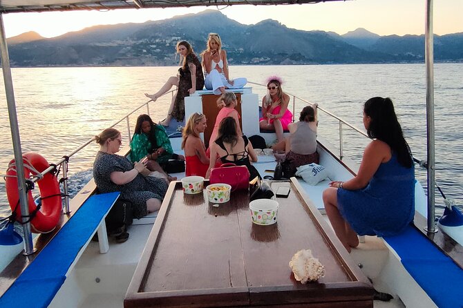 Taormina Sunset Aperitif on-Board - Capotaormina and the view toward Etna