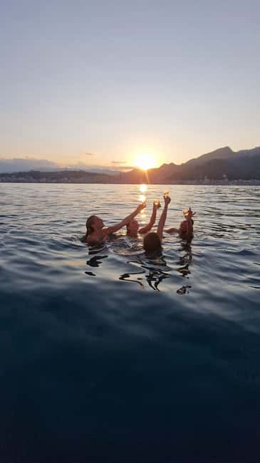 Taormina: Sunset Boat Tour with Aperitif - Stop by stop: the caves, bays, and sea-only scenery