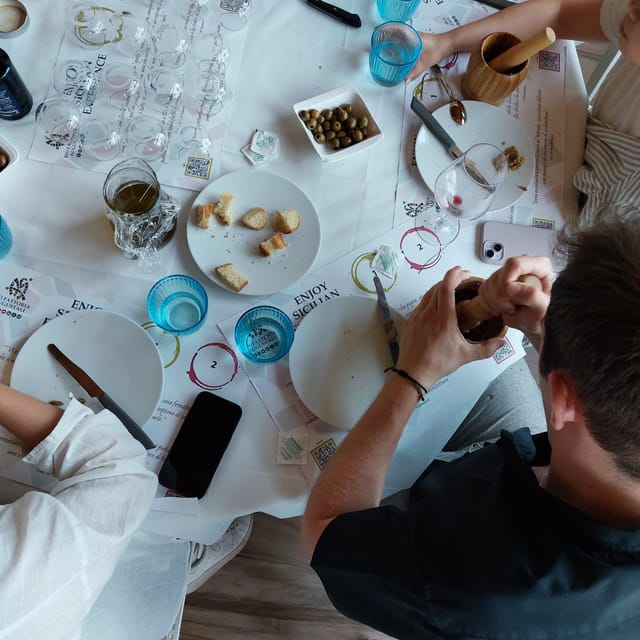 Tasting of sicilian olive oils and specialties - Olive groves and vineyards, not a classroom