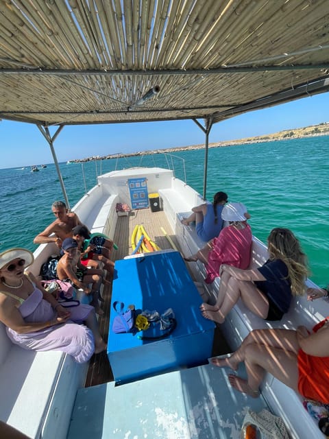 Terrasini: Boat Tour of the Terrasini Caves - Food and drinks on board: fruit, Sicilian aperitif, and the add-ons you might notice