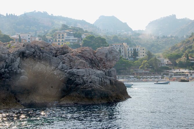 Tour to Baia di Taormina, Isola Bella and Naxos - Giardini Naxos Bay: Secluded Beaches and Snorkeling Options